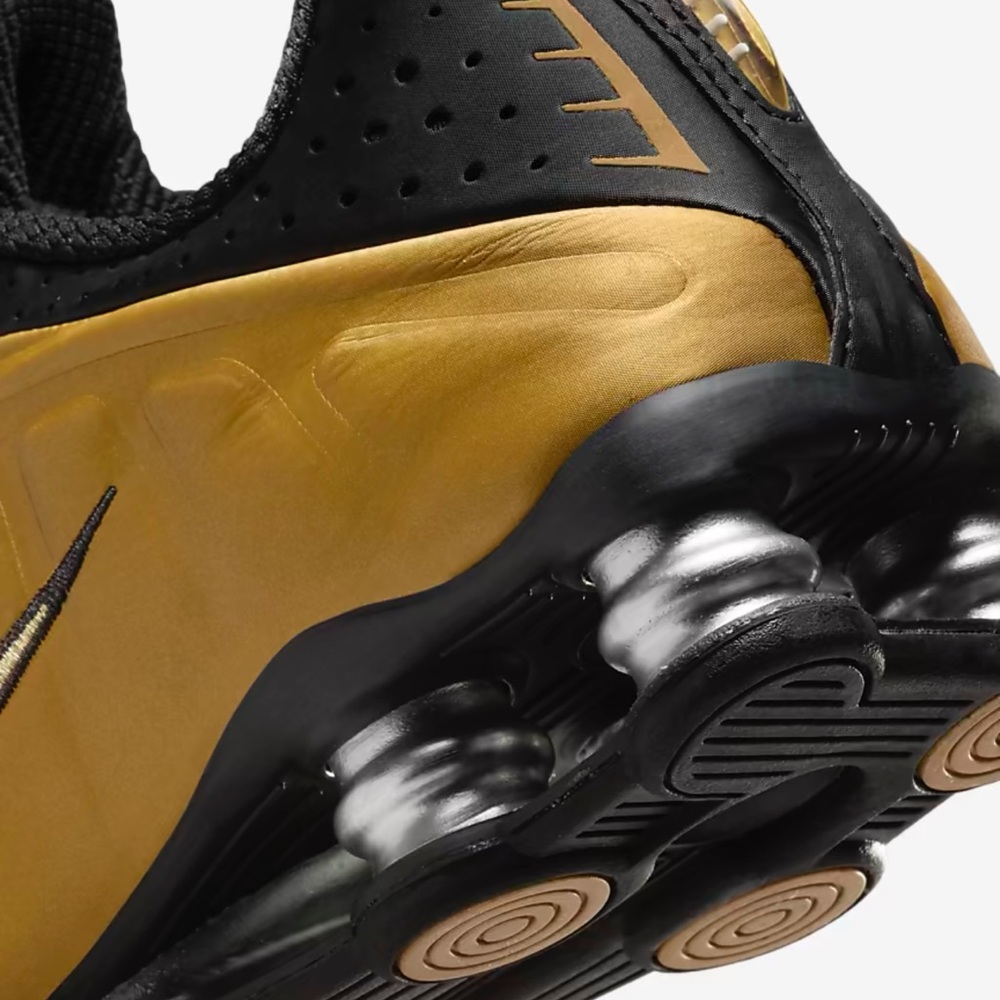 Nike WMNS Shox R4
Sneakers 
Black/Metallic Silver/Metallic
Gold
Style AR3565-005 - Picture 16 of 16